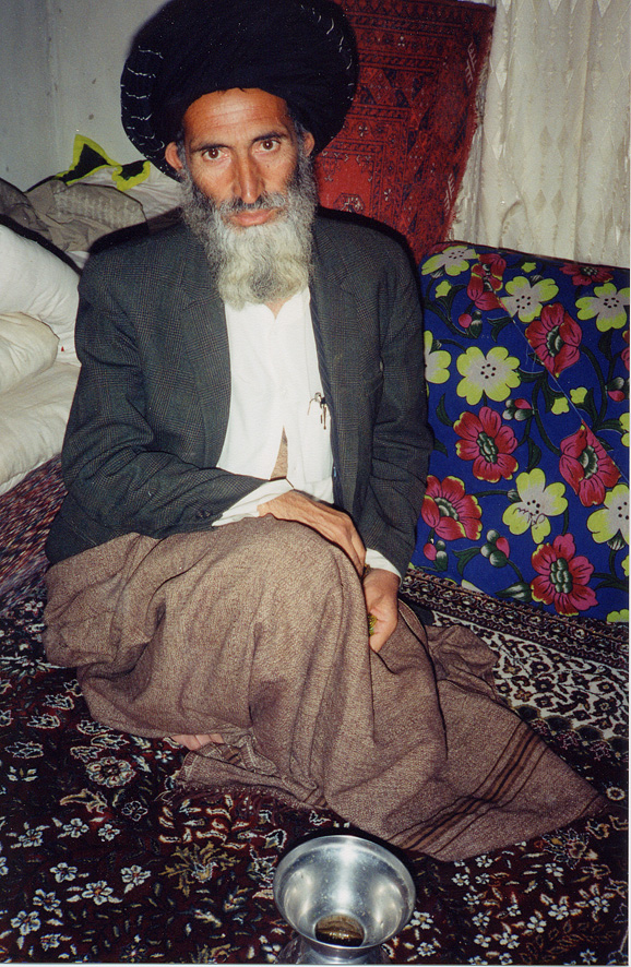 Elderly Man Sitting On Rug / Afghanistan / Pushtun - Click Image to Close