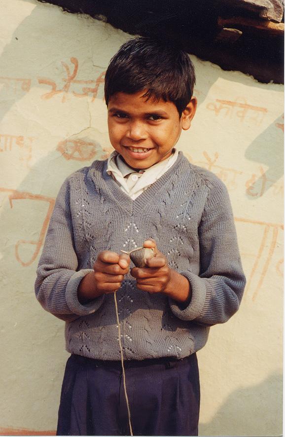 Young Boy Smiling With A Toy / Nepal / Bugpuri - Click Image to Close