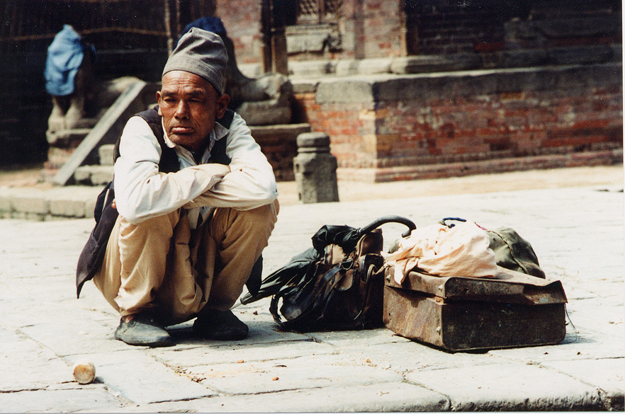 Old Man Squatting With Bags, Katmandu / Nepal - Click Image to Close