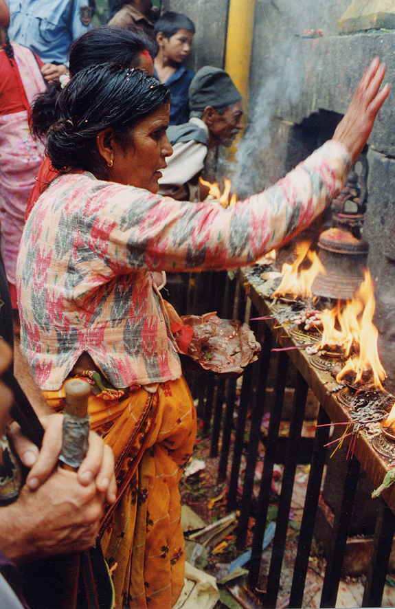 Worshipers Burning Incense And Chanting / Nepal / Nepali