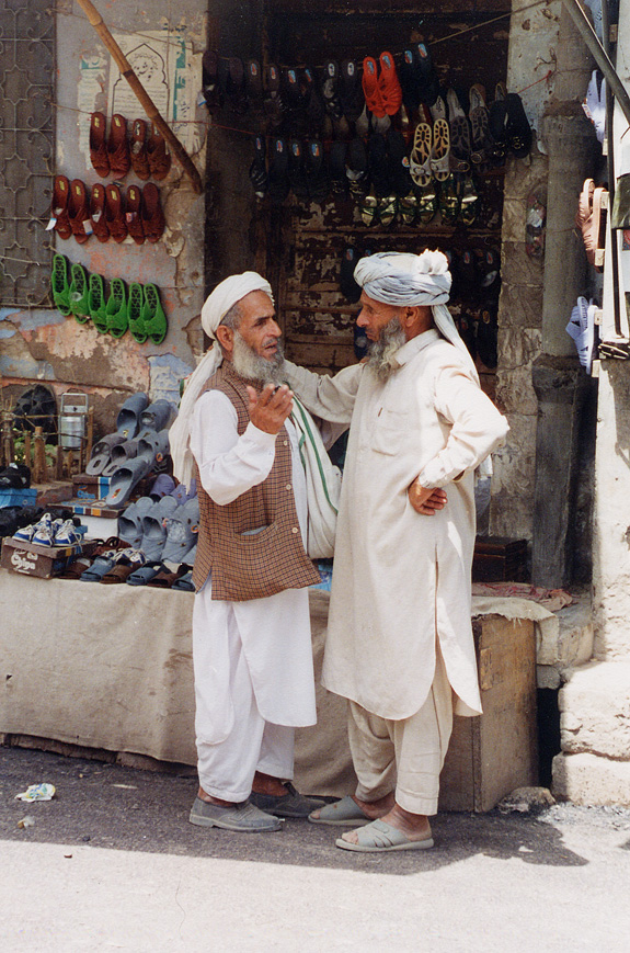Two Men Talking / Pakistan / Pushtun - Click Image to Close