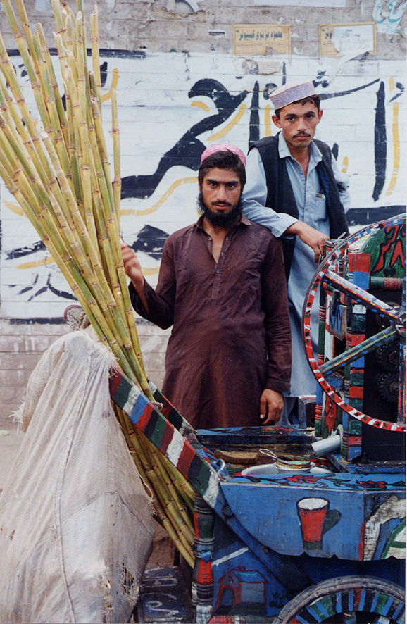 Two Men Selling On Street / Pakistan / Pushtun - Click Image to Close