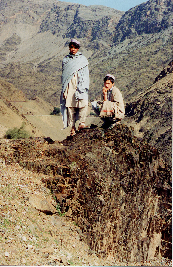 Two Young Men On A Mountainside / Pakistan / Wazari